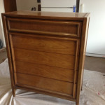 Pots and Pans and Paintbrushes dresser before